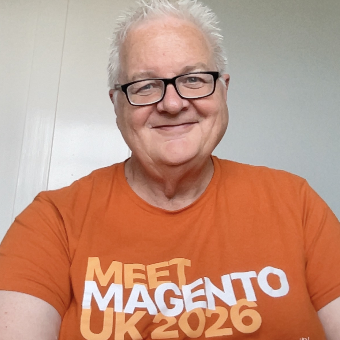 Jonathan Campbell, Founder of Accentika, wearing Meet Magento UK 2026 t-shirt